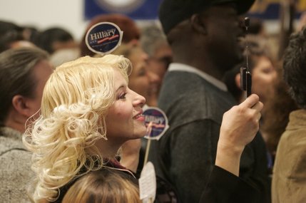 Esther Ramos takes a photo with her camera phone as presidential candidate Sen. Hillary Clinton speaks at the Sheet Metal Workers Union Saturday, Jan. 12, 2008. 