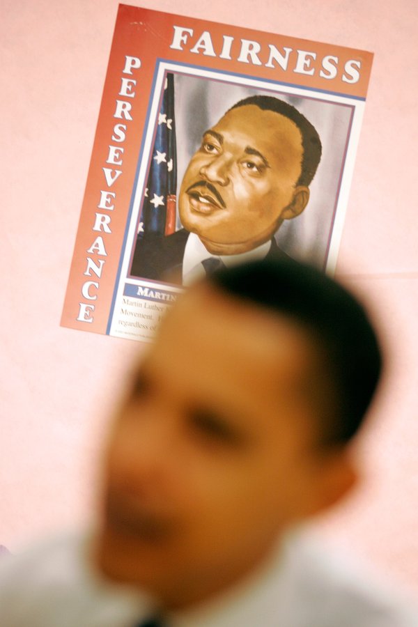 Democratic presidential hopeful Sen. Barack Obama is framed by a ...