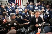 Supporters and journalists surround John Edwards during an appearance Wednesday at the Steelworkers union hall in Henderson. The union has endorsed the former senator from North Carolina.