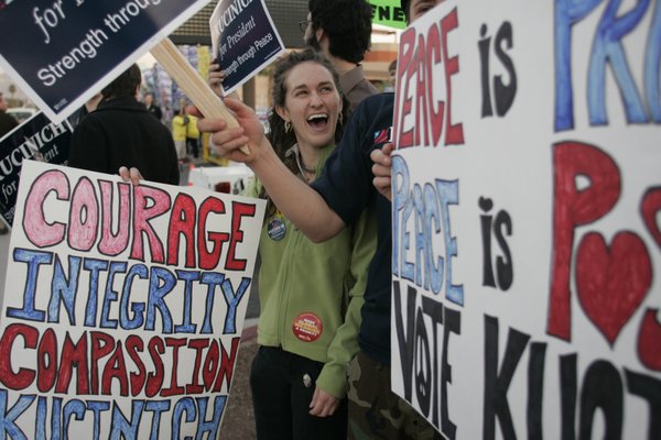A group of Dennis Kucinich supporters proudly display their candidate's ...