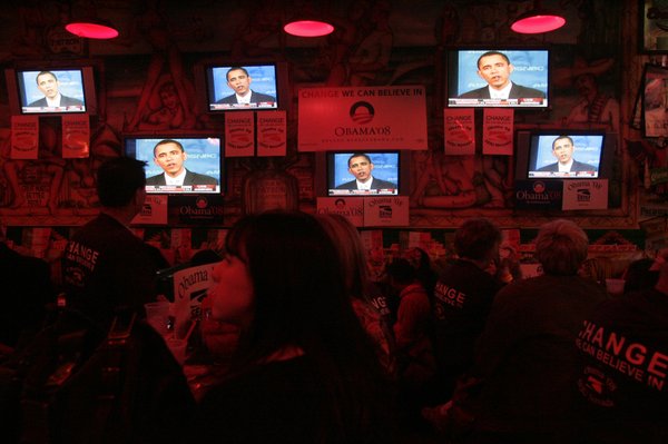 SEIU members and Barack Obama supporters watch their candidate during ...