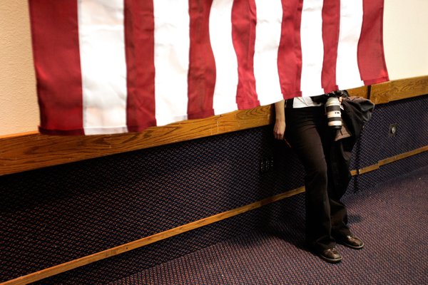 A local photographer covers presidential hopeful John Edwards during a ...