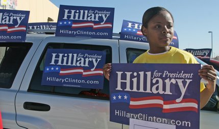 Ninth grader Tammy Esters supports Hillary Clinton during the democratic caucus at Tarr Elementary School.