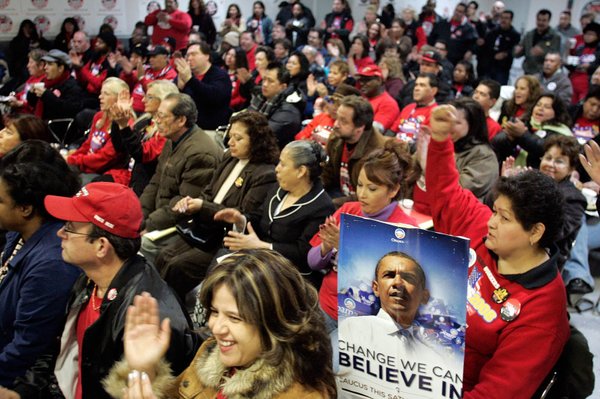 Culinary members clap and cheer during a caucus day rally ...