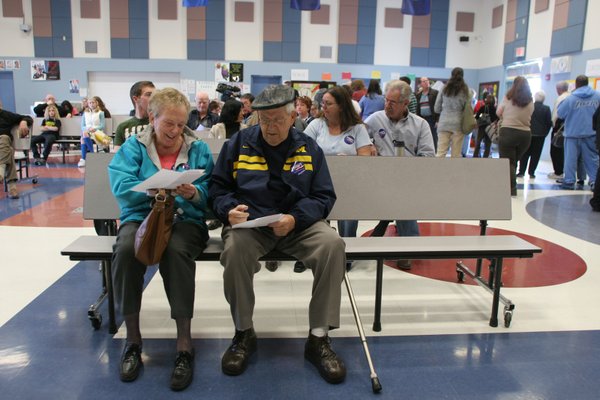 Barbara Mailhot and her husband Davis go over the ballot ...