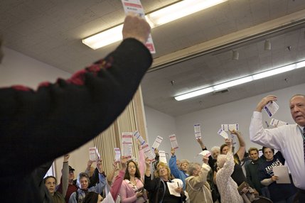 Permanant chairman of Searchlight, Nevada precinct 1072, Stan Colton, right, counts eligible attendees sided with Sen. Hillary Clinton during the democratic presidential caucus at the Searchlight Community Center on Saturday afternoon.