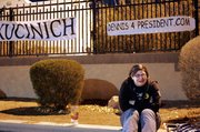 Briana Falb-Joslin of St. Paul, Minn., cries outside Cashman Center after hearing Dennis Kucinich was out of the debate in Las Vegas.