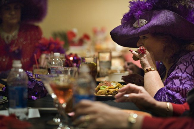 Red Hatter Lynda Pepitone of the Desert Bloomers of Henderson is one of more than 1 million Red Hatters around the world, all past age 50. When members attend society events they leave the men at home.