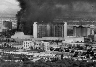 Smoke billows out of the MGM Grand as the hotel is engulfed in flames on Nov. 21, 1980. Faulty wiring in an unused delicatessen is the cause of the worst disaster in Nevada history and the country's second-worst hotel fire. 