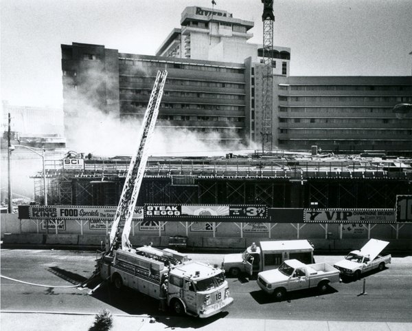 Authorities work to put out the fire at the Riviera ...