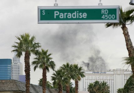 Smoke pours from the top of the Monte Carlo Friday, Jan. 25, 2008.