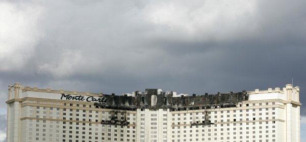 The charred upper floors of the Monte Carlo show where ...