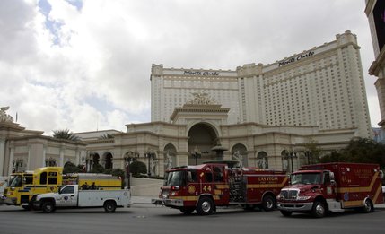 Fire trucks are stationed in front of the Monte Carlo hotel and casino during a roof fire in Las Vegas, Nevada January 25, 2008.
