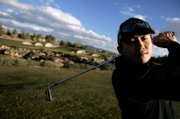 Han unwinds after practice Monday at Southern Highlands Golf Club. Han, a 21-year-old junior, is studying sociology and hotel management.