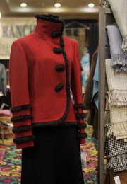 The fashion show portion of the alpaca convention Fiber to Fashion features clothes like this jacket and scarves. 