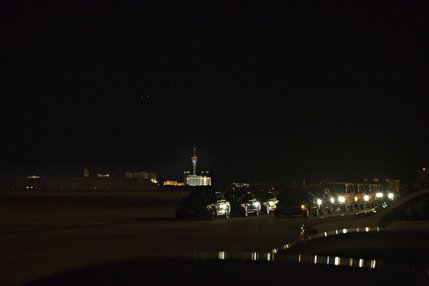 The presidential motorcade waits for President George W. Bush to arrive on Air Force One at McCarran International Airport in Las Vegas on Wednesday night, January 30, 2008.