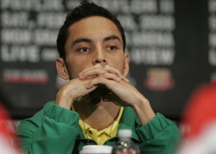 WBO super flyweight champion Fernando Montiel of Mexico listens to speakers during a news conference at the MGM Grand Wednesday February 13, 2008. Montiel will defend his title against Martin Castillo, also of Mexico, at the MGM Grand Garden Arena Saturday.
