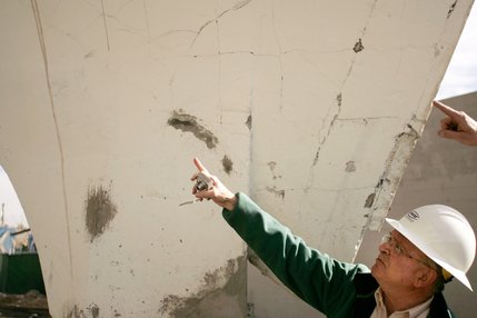 Engineer Mel Green examines the structure of the old La Concha Motel lobby.