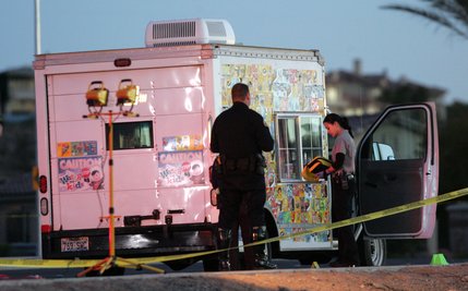 Authorities investigate an officer related shooting, involving two ice cream trucks driven by a husband and wife, at the intersection of Coronado Center Drive and Sunridge Heights Parkway on Feb. 12. HEATHER CORY / HENDERSON HOME NEWS