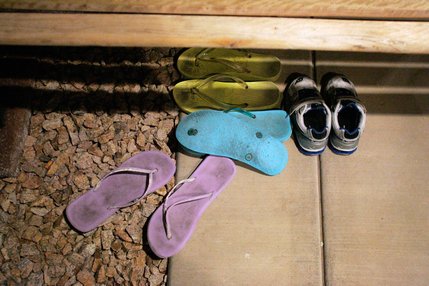 The sandals of Albanian immigrant Deshira Selimaj still sit outside the front door of her Henderson home. Deshira was killed by a Henderson police officer at the scene of a traffic stop involving her husband in his ice cream truck near Coronado High School.