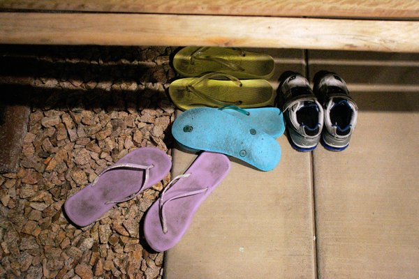 The sandals of Albanian immigrant Deshira Selimaj still sit outside ...