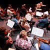 The Las Vegas Philharmonic’s string section rehearses with Musical Director David Itkin in September. Itkin’s goal has been to bring the orchestra to a higher level, and the musicians say he has succeeded.