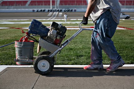 Approximately 900 gallons of paint - primarily red, white, blue and black, were used in decorating the track for this weekend's NASCAR race at Las Vegas Motor Speedway.