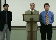 Endoscopy Center of Southern Nevada doctors Sanjay Nayyar, left, and Clifford Carrol flank fellow doctor Eladio Carrera as he reads a statement  during a news conference at the health district Wednesday, February 27, 2008. The Southern Nevada Health District is notifying about 40,000 former patients of the Endoscopy Center of Southern Nevada that they may have been exposed to hepatitis C.