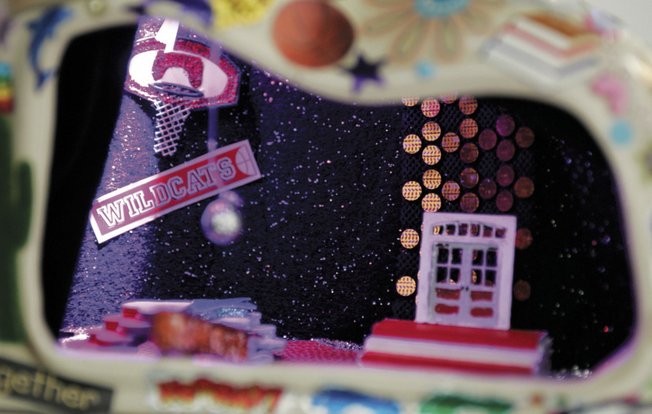 A detail from “Stick to the Stuff You Know” by Todd VonBastiaans in his gallery in downtown Las Vegas shows the artist’s playful use of props and delight in color and light. VonBastiaans created the miniatures at the suggestion of Trifecta Gallery owner Marty Walsh. 