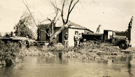 A salvage party dismantles a house in St. Thomas, Nevada in 1942. St. Thomas, which was abandoned to the rising waters of Lake Mead in 1938, has resurfaced due to fluctuating lake levels several times over the decades.