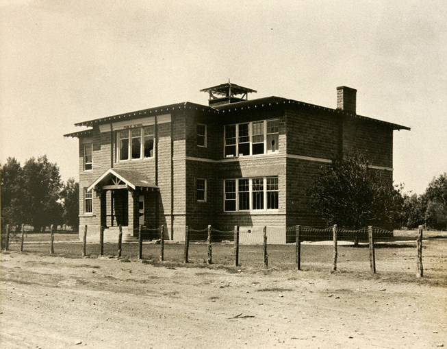 A photograph taken May 13, 1934 shows the abandoned school building in St. Thomas. 