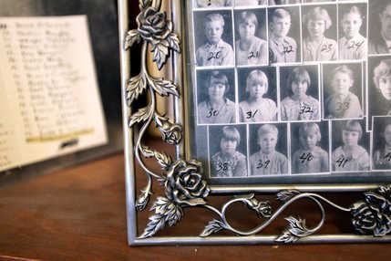 A photo of Verna Heller, second row far left #30, is displayed next to her St. Thomas School classmates in the office of Beezy Tobiasson in Overton. Tobiasson is writing the history of St. Thomas, a town near Overton that was abandoned to the waters of Lake Mead in 1938.