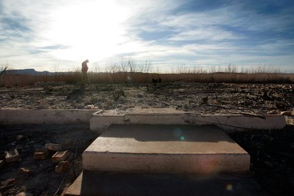 Aaron McArthur, a UNLV doctoral student writing a history of St. Thomas for the National Park Service, explores the site of the Gentry Hotel. The significance of the the town has changed over the years, he said. 