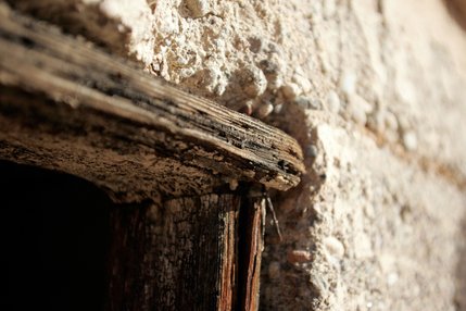 Wooden framing at the window of a building in the lost town of St. Thomas. The wood will deteriorate more quickly exposed to sun and wind than it will if it were covered by water. 