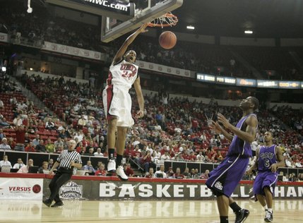 UNLV guard Rene Rougeau dunks during the first half of their game against TCU Thursday, March 13, 2008 at the Mountain West Conference championships.  