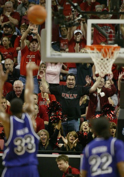 UNLV fans try to distract TCU's Alvardo Parker as he shoots a free throw during their game Thursday, March 13, 2008 at the Mountain West Conference championships.  