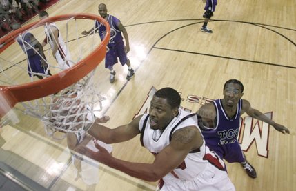 UNLV guard Wink Adams rolls in two points during their game against TCU Thursday, March 13, 2008 at the Mountain West Conference championships. 