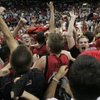 UNLV Rebels and fans celebrate their 76-61 defeat of BYU in the Mountain West Conference championship game Saturday, March 15, 2008 at the Thomas &amp; Mack Center.