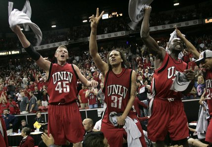 From left, UNLV's Joe Darger, Curtis Terry and Corey Bailey celebrate their 76-61 defeat of BYU in the Mountain West Conference championship game Saturday, March 15, 2008 at the Thomas & Mack Center.