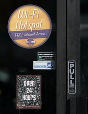 A sign advertises free Wi-Fi, or wireless fidelity, Internet service at the It’s a Grind franchise at 8470 W. Desert Inn Road in Las Vegas. 