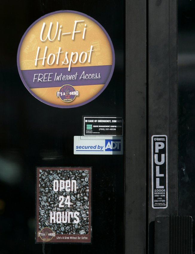 A sign advertises free Wi-Fi, or wireless fidelity, Internet service at the It’s a Grind franchise at 8470 W. Desert Inn Road in Las Vegas. 