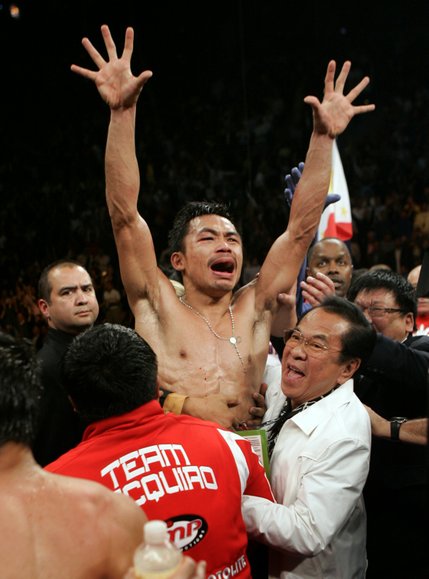 Manny Pacquiao celebrates after being announced the winner.