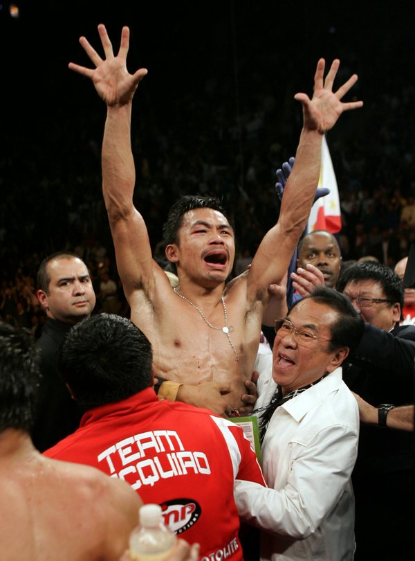 Manny Pacquiao celebrates after being announced the winner.