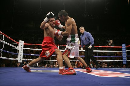 Abner Mares connects on a punch to the head of Diosdado Gabi.