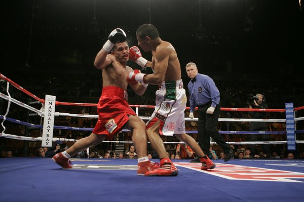 Abner Mares connects on a punch to the head of ...