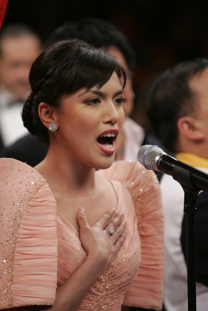 Singer Ciara Anna Sotto sings the Philippine national anthem before the Juan Manuel Marquez and Manny Pacquiao super featherweight fight.