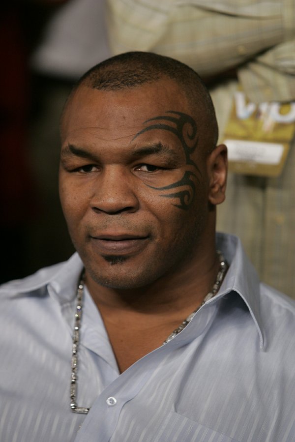 Former heavyweight boxer Mike Tyson watches the Juan Manuel Marquez ...
