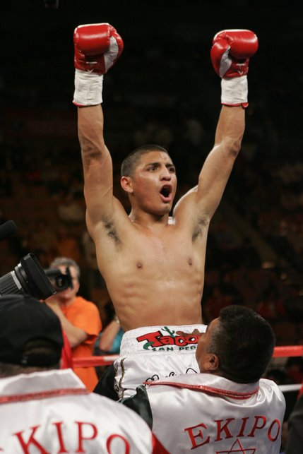 Bantamweight boxer Abner Mares of Mexico celebrates his victory over Diosdado Gabi of the Philippines on Saturday. Later in the night, the Phillipines exacted revenge with Manny Pacquiao's win against Mexican Juan Manuel Marquez.