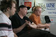 Stagehands, from left, Chris Martini, Chris Minkema and Paul Bordenkircher talk in June 2007 about the union vote. 