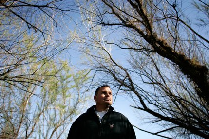 Nicholas Rice, an environmental biologist with the Environmental Monitoring and Management Division of the Southern Nevada Water Authority stands among the invasive tamarisk plants that grow in abundance along the Las Vegas Wash. Rice has helped to remove 200 acres of tamarisk from around the wash and revegetate the area with native species. 